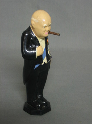 A plaster figure of a standing Sir Winston Churchill 7"
