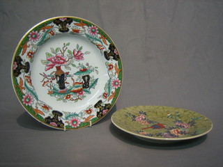 A 19th Century Spode plate decorated a bird, the reverse impressed Spode 9" and an Ashworth Ironstone plate with Imari style decoration 10" (chip to reverse)