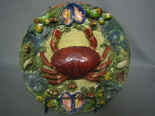 A Portuguese Majolica pottery plate decorated a crab, the reverse impressed Galuhs Portugal 13"