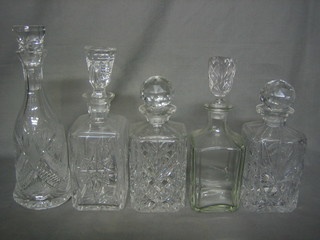 4 cut glass spirit decanters and a club shaped decanter