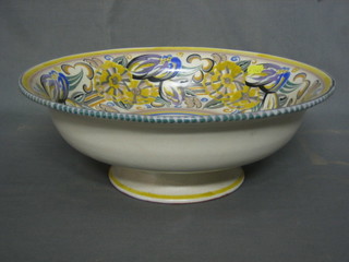 A Poole Pottery pedestal bowl with floral decoration, the base impressed Poole England 14", base chipped