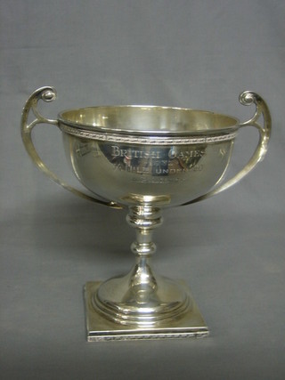 A silver twin handled trophy cup, 1931 "The British Games 1932 3.4 Under 20 Race" 22 ozs