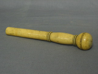 A turned ivory parasol handle 8"