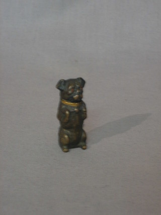 A gilt metal vesta in the form of a seated dog 2"