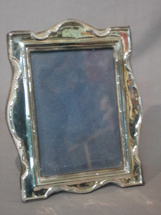 A modern silver easel photograph frame 5" x 4"