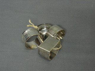 4 various silver napkin rings 2 ozs