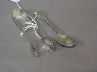 A pair of silver plated sugar tongs together with a silver plated Society of small miniature rifle clubs teaspoon