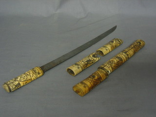 An Oriental dagger with 15" blade contained in an ivory scabbard (scabbard f)
