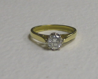 A lady's 18ct gold dress ring set a large cut diamond