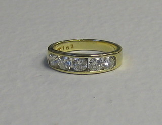 A lady's 18ct gold engagement/dress ring set 5 large circular cut diamonds
