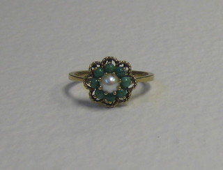 A Victorian 9ct gold cluster ring set pearls surrounded by turquoise