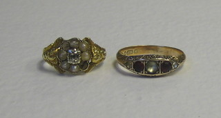 A 19th Century gold dress ring set diamonds, surrounded by pearls (some pearls missing) together with a 9ct gold dress ring set red and white stones (2)
