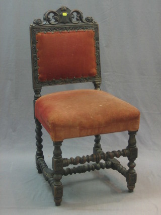 A Victorian carved oak high back hall chair, raised on turned and block supports, upholstered in pink material