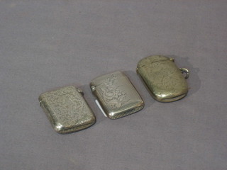 2 engraved silver vesta cases and 1 other
