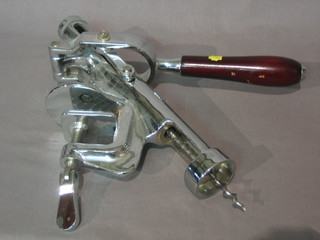 A chromium plated table mounting corkscrew