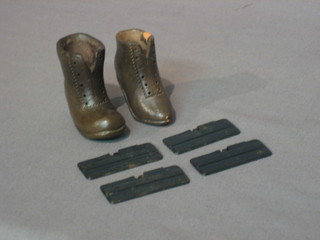 2 terracotta models of shoes 2" and 4 Compo ration tin openers marked Heinz