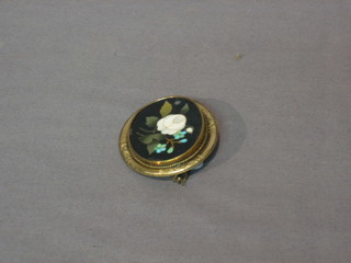 An oval micro mosaic brooch contained in a gilt mount 2"