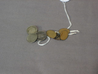 A pair of gold plated silver cufflinks and a pair of cufflinks formed from coins
