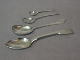 A Victorian silver fiddle pattern teaspoon, a jam spoon and 2 other spoons