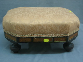 A Victorian Kingwood and ebony lozenge shaped footstool raised on bun feet 16"