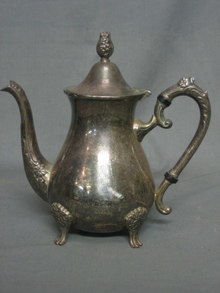 A modern silver plated coffee pot