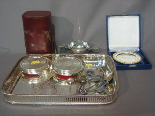 An oval silver plated galleried tea tray, a silver plated twin handled quaiche, a collection of various silver plated coasters, 2 silver plated hip flasks etc