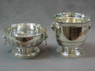 A circular silver plated twin handled wine cooler and a rose bowl