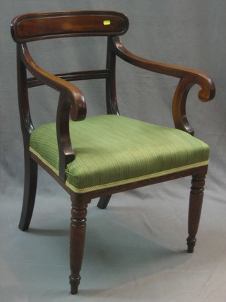 A 19th Century mahogany bar back desk chair with plain mid rail and upholstered seat, raised on turned supports