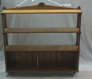 An Edwardian walnut 4 tier hanging wall shelf with turned and fluted columns 36"