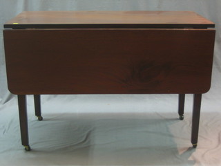 A 19th Century mahogany drop flap gateleg table, raised on square supports 42"