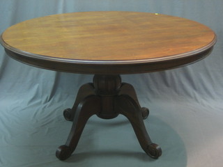 An African Georgian style oval hard wood breakfast table, raised on a pillar and tripod support 54"