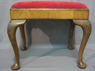 A rectangular Queen Anne style walnut stool with upholstered drop in seat, raised on cabriole supports 22"