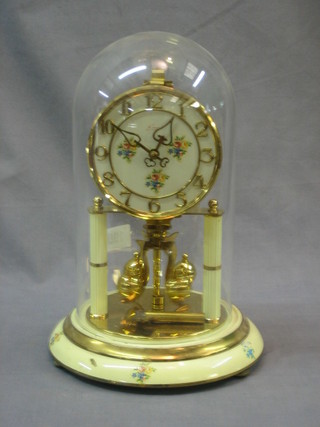 A German 400 day clock complete with glass dome