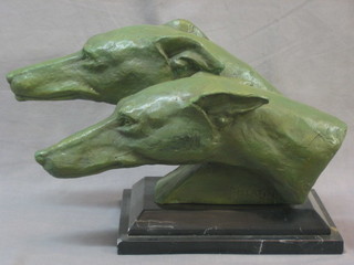 A bronze head and shoulders portrait of 2 grey hounds, raised on a marble base 16"