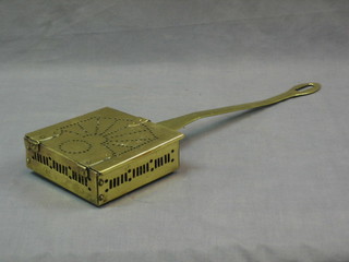 A square pierced brass chest nut roaster