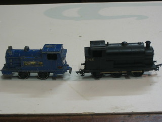 A Triang black tank engine and a Dinky metal tank engine