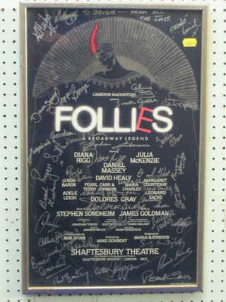 A signed film poster from Follies Shaftsbury Avenue signed by Diana Rigg, Douglas Gray, Teddy Johnson, Margaret Courtney and many others 20" x 12", framed