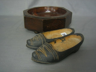 A pair of Eastern wooden slippers, a turned wooden fruit bowl 10"