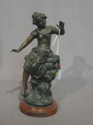A 19th Century bronze figure of a seated girl 8"