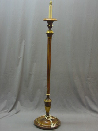 A walnut turned and fluted standard lamp with gilt decoration