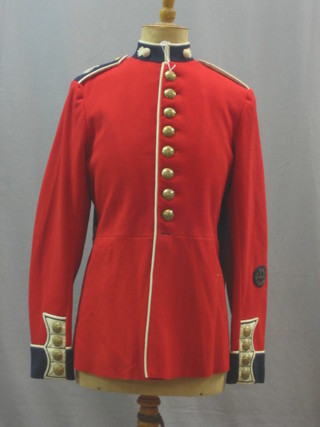 A George V Grenadier Guards Guardsman tunic, labelled Tunic for the Guards R & F Grenadiers size 22, height 5' 11", breast 39" by the Rego Clothiers Ltd, together with a pair of officer's overalls