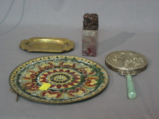 An Eastern hard stone seal decorated a dog of fo 4", a circular Eastern plate 7", a brass ashtray 5" and a mirror