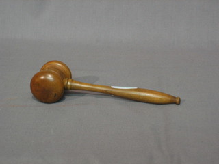 A turned wooden gavel