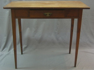 A 19th Century oak side table fitted a drawer raised on square tapering supports 34"