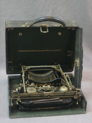 A Corona portable manual typewriter contained in a fibre case