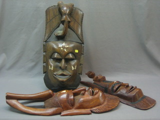 4 various African carved wooden masks
