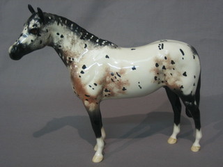 A Beswick figure of a standing Appaloosa horse 8"