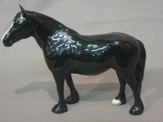 A Beswick figure of a standing black shire horse 6 1/2"