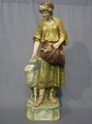 An large and impressive Royal Dux figure of a Shepherdess and Sheep, the base with pink Royal Dux mark and impressed 1061 38"