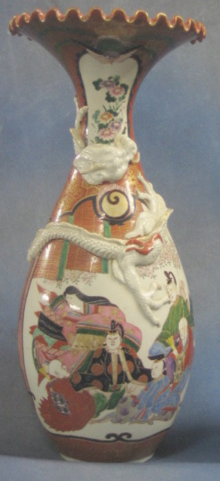 A 19th Century Oriental vase with flared neck decorated dragon and court figures, the base with signature mark 22" (f and heavily cracked)